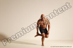 Underwear Gymnastic poses Man Black Muscular Bald Dancing Dynamic poses Academic